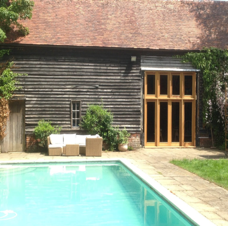 full length wooden windows in barn david matthews carpentry and joinery basingstoke