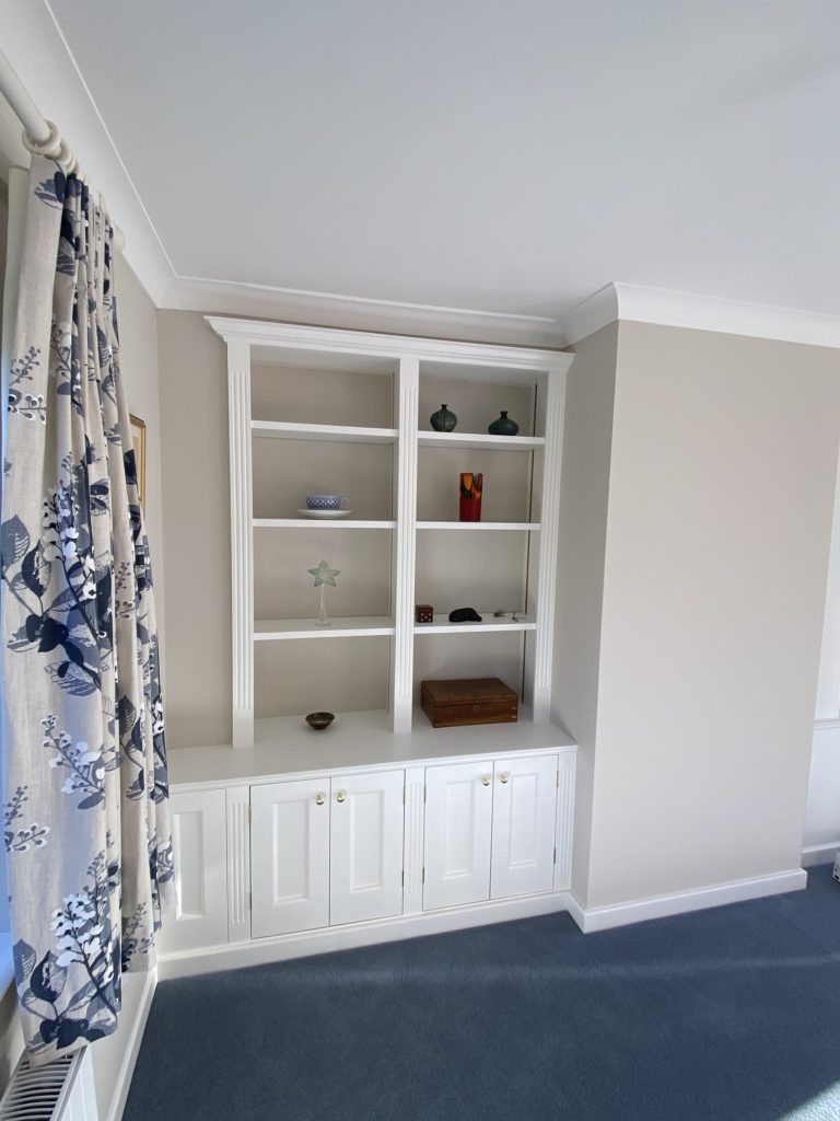 Bespoke fitted bookcase and storage cupboards david matthews
